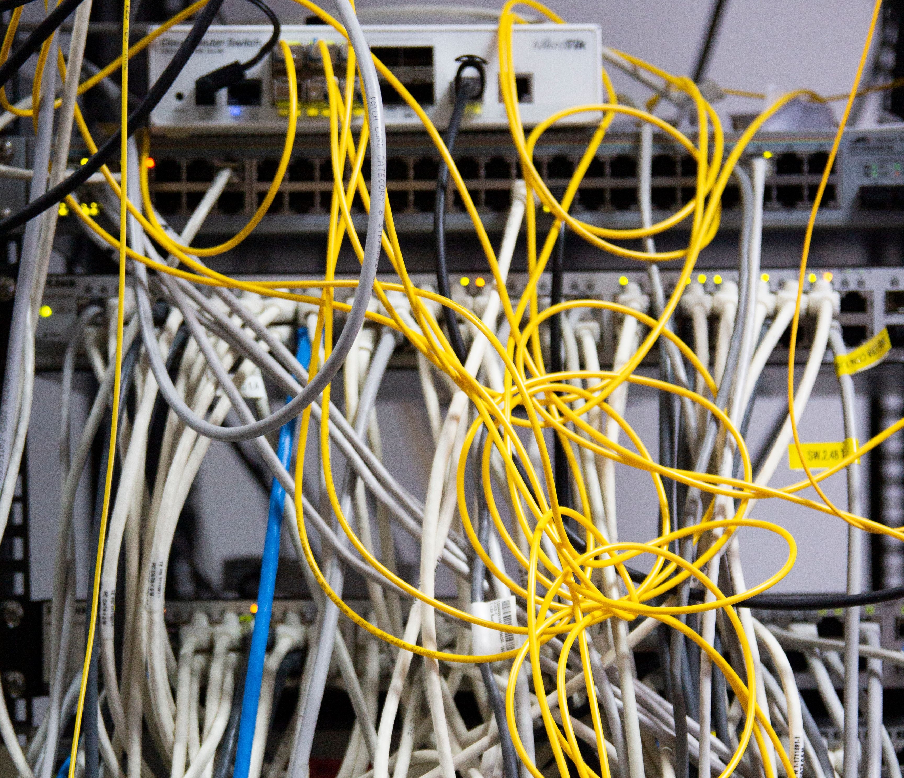 Engineers modernizing legacy infrastructure onto a scalable cloud architecture